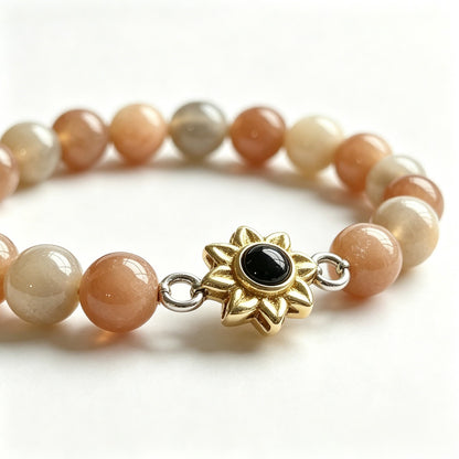 Aurmory Sunstone Memory Projection Bracelet — close-up view of sunstone beads and crystal projection pendant detail