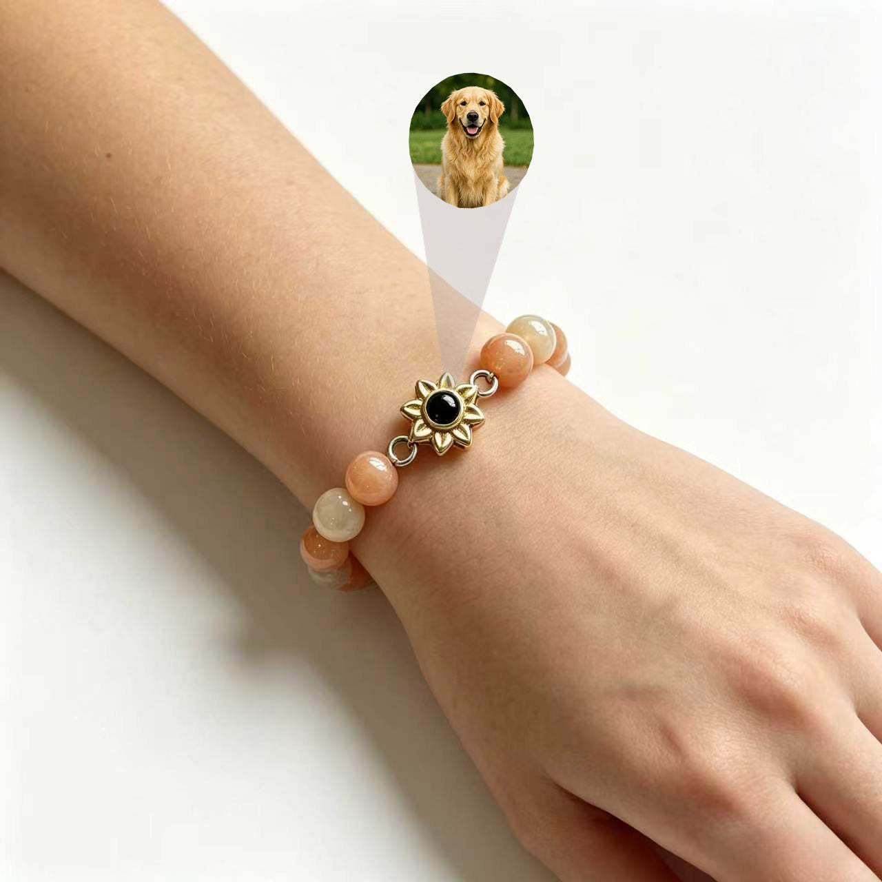 Aurmory Sunstone Memory Projection Bracelet worn on wrist, showing pet photo projection inside crystal pendant