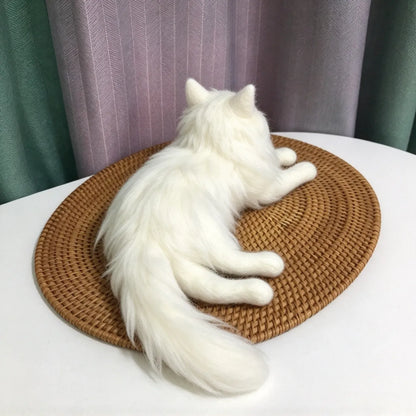 Custom needle-felted cat sculpture showing the pet’s body and markings